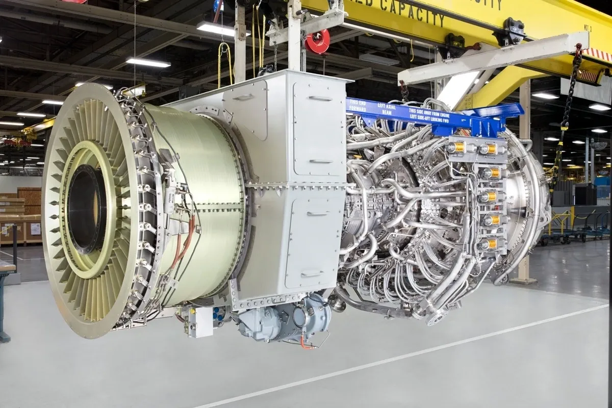 A large jet engine in an industrial setting.